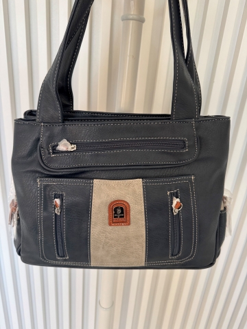 Dámská prostorná tmavě modrá kabelka, s popruhy přes rameno