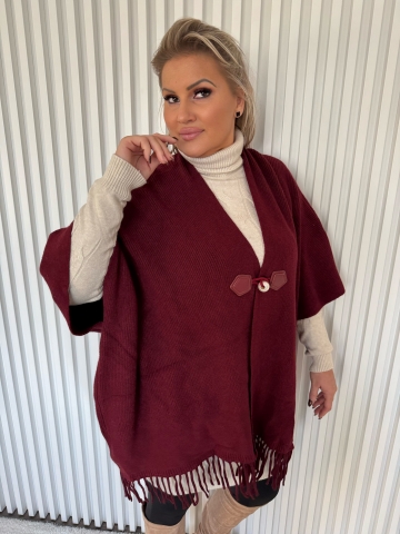 Elegantní dámské pončo s třásněmi a ozdobným zapínáním